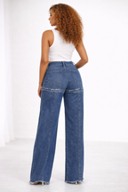 JEANS AMPLE À OURLET EFFILOCHÉ